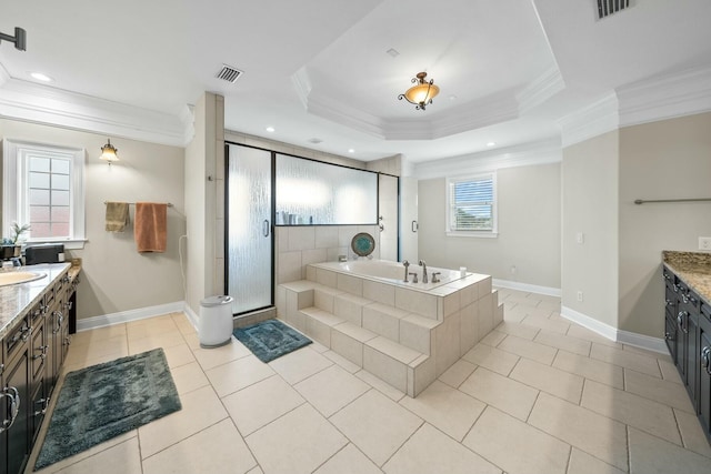 bathroom featuring vanity, tile patterned flooring, separate shower and tub, ornamental molding, and a tray ceiling