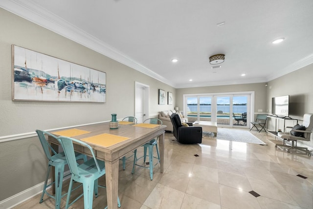 tiled dining area with ornamental molding