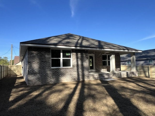 back of property with a patio area