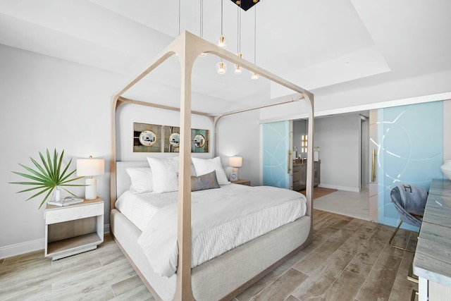 bedroom featuring hardwood / wood-style floors