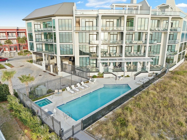 view of swimming pool featuring a patio area