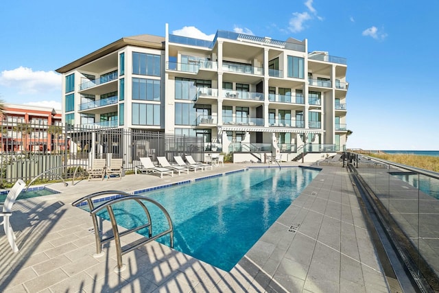 view of swimming pool featuring a patio