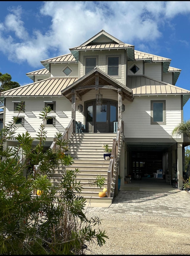 view of front of home featuring a carport