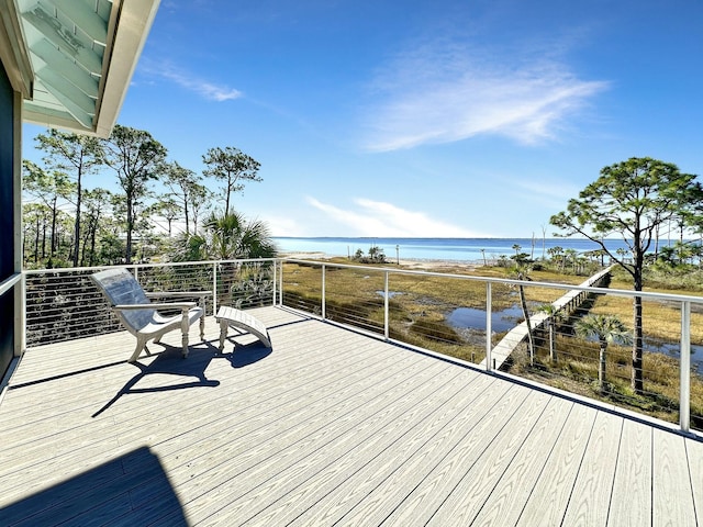 deck featuring a water view