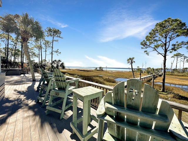 deck featuring a water view