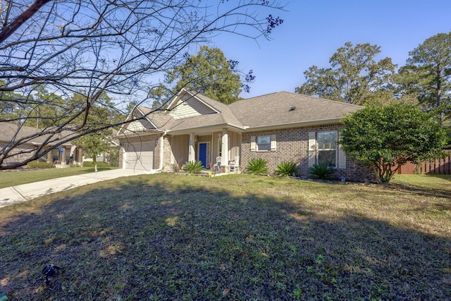 view of front of property with a front yard and a garage