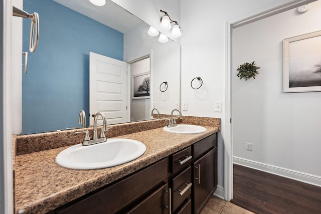 bathroom featuring vanity and hardwood / wood-style flooring