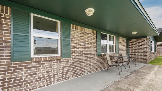 view of patio featuring a porch