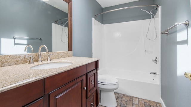 full bathroom featuring vanity, toilet, and shower / washtub combination