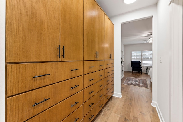 hallway with light wood-type flooring