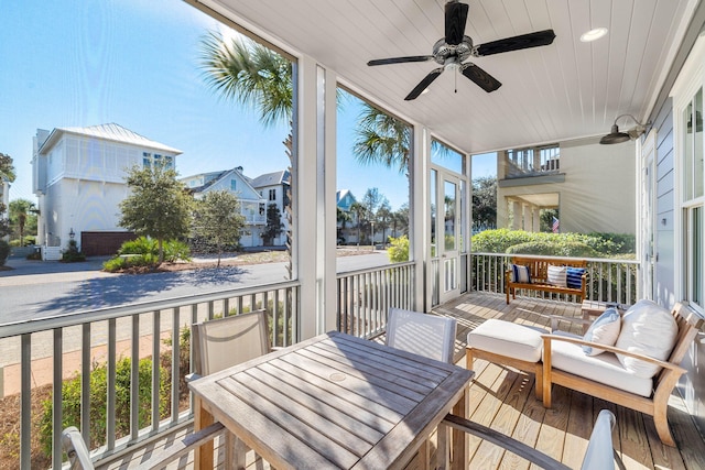 wooden deck with ceiling fan