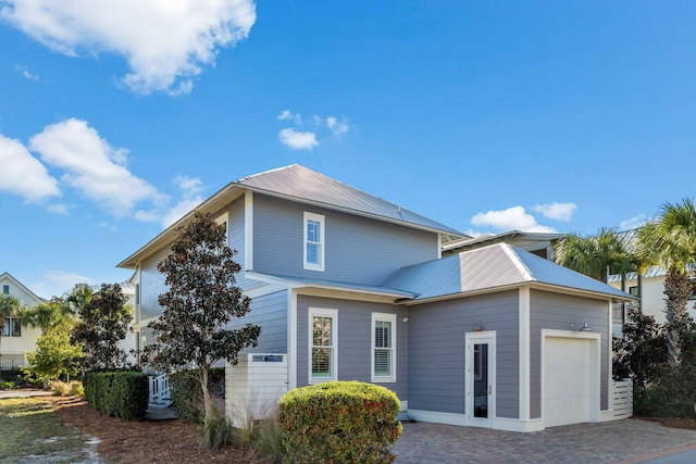 exterior space with a garage