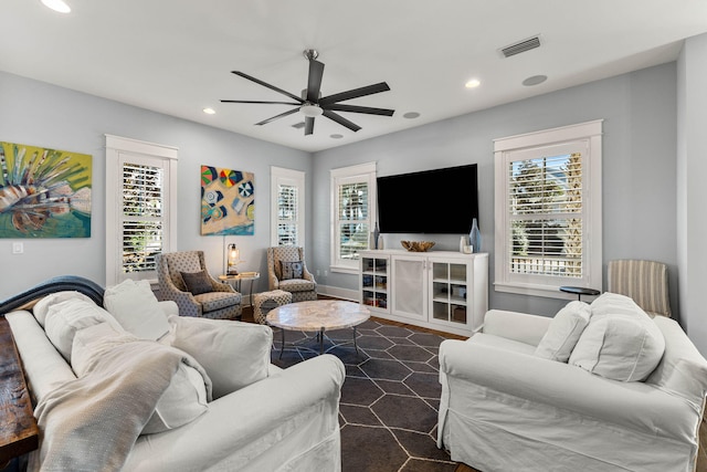 living room with ceiling fan