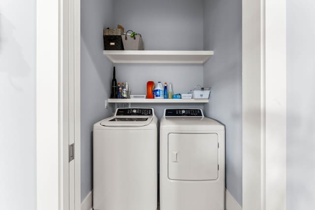 laundry area with washer and dryer