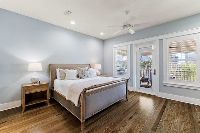 bedroom featuring access to exterior, ceiling fan, and dark wood-type flooring