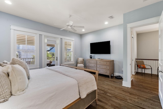 bedroom featuring access to exterior, ceiling fan, and dark wood-type flooring