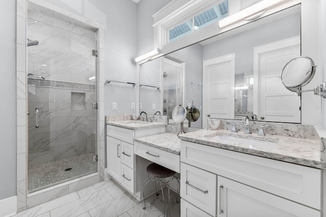 bathroom featuring vanity and an enclosed shower