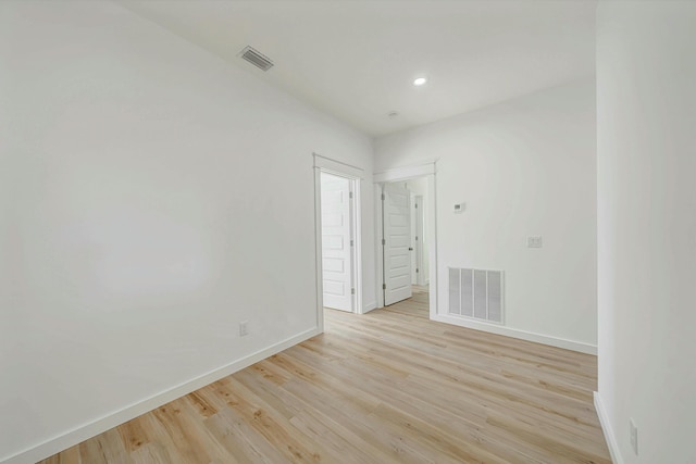 empty room featuring light hardwood / wood-style floors