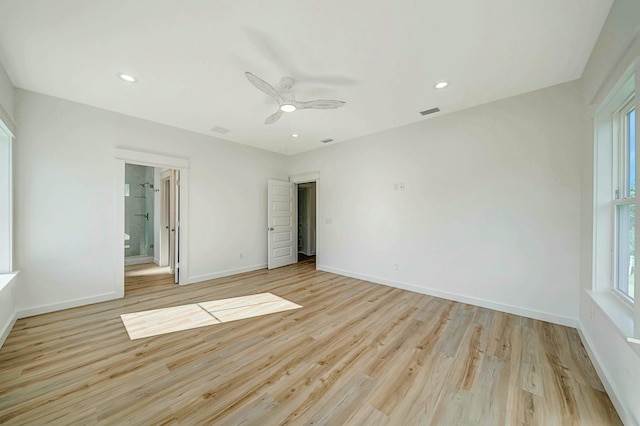 unfurnished bedroom with ceiling fan and light hardwood / wood-style flooring