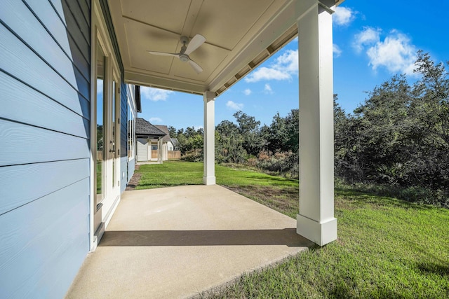 view of patio featuring ceiling fan