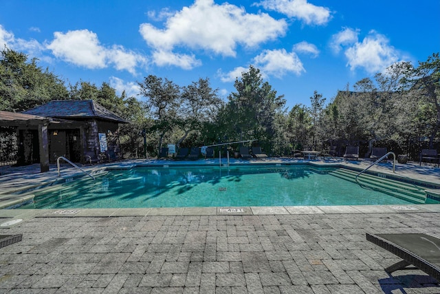 view of pool with a patio