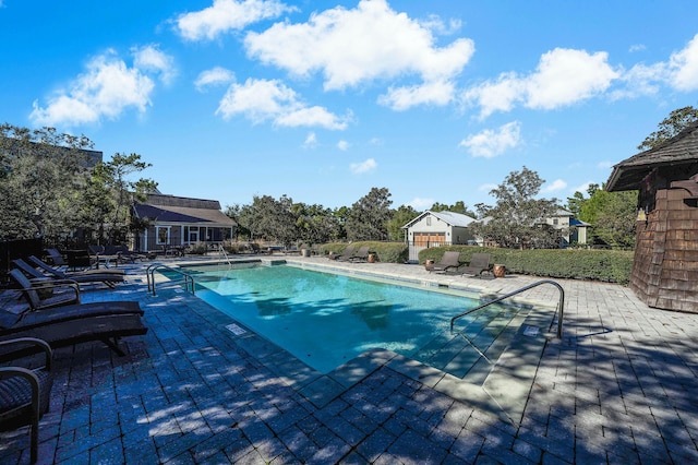 view of pool featuring a patio