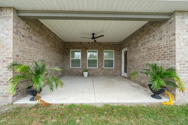 view of patio with ceiling fan