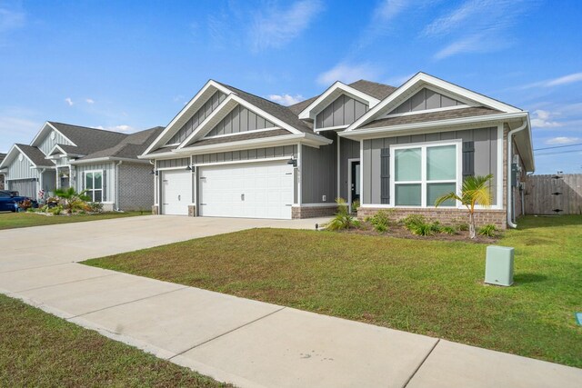 craftsman-style house with a garage and a front yard