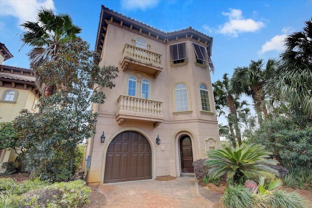 63 Rue St, Tropez, Miramar Beach, FL 32550 - mediterranean / spanish house with a garage and a balcony