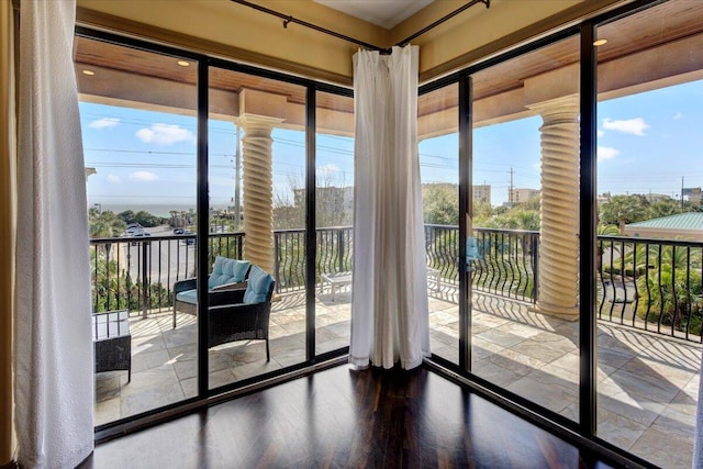 doorway to outside featuring hardwood / wood-style flooring