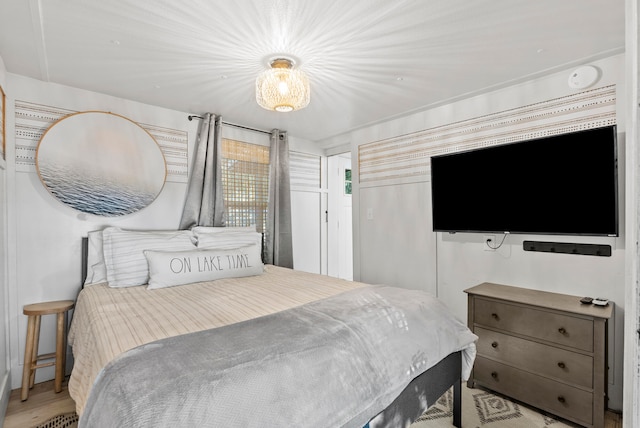 bedroom with light wood-type flooring