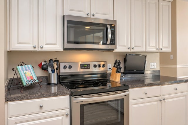 kitchen featuring white cabinets and stainless steel appliances