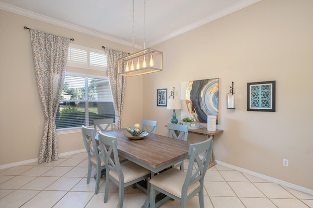 tiled dining space featuring crown molding