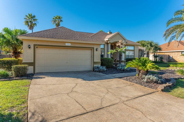 single story home featuring a garage