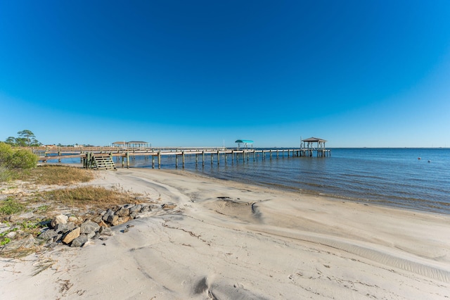 property view of water featuring a beach view