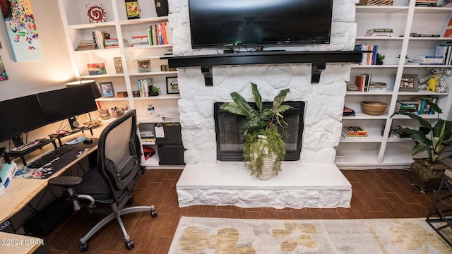 office with a fireplace and dark hardwood / wood-style flooring