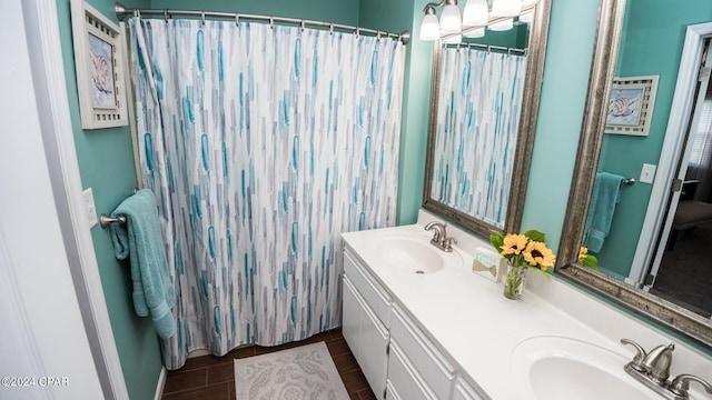 bathroom with vanity and walk in shower