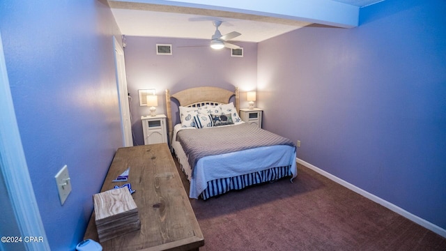 carpeted bedroom featuring beamed ceiling and ceiling fan