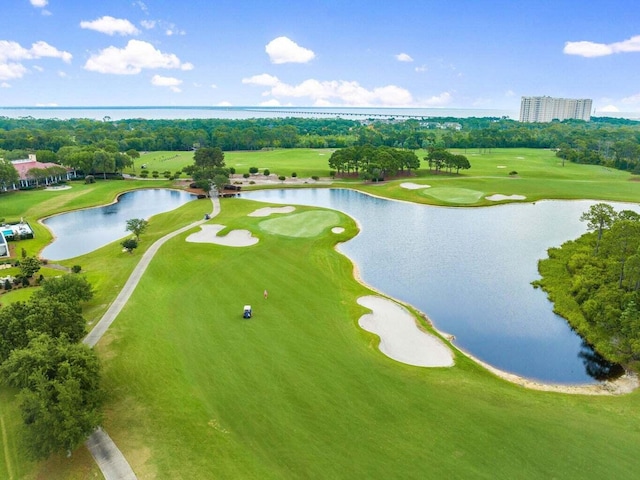 bird's eye view featuring golf course view and a water view