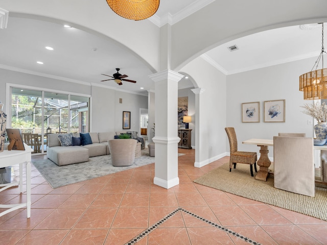 living room with arched walkways, recessed lighting, light tile patterned flooring, and baseboards