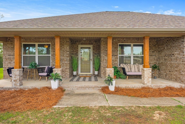 property entrance with covered porch