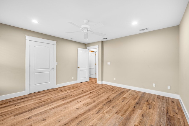 unfurnished bedroom with light wood-type flooring and ceiling fan