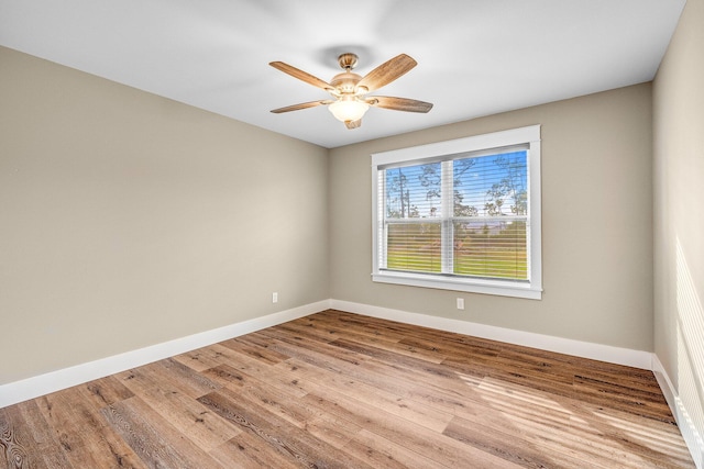 spare room with light wood-type flooring