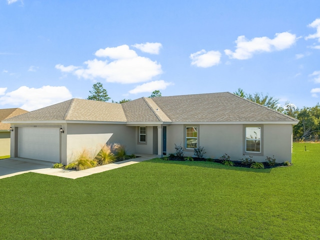 ranch-style house featuring a front yard and a garage