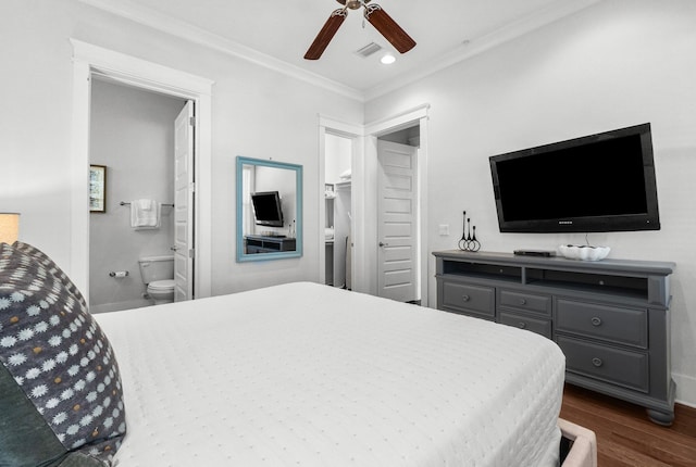 bedroom with ensuite bathroom, dark hardwood / wood-style flooring, ceiling fan, and crown molding