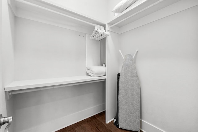 82 Gulfview Way, Santa Rosa Beach, FL 32459 - walk in closet featuring dark wood-type flooring