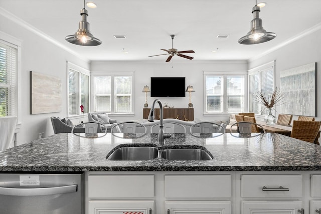 82 Gulfview Way, Santa Rosa Beach, FL 32459 - kitchen featuring a sink, open floor plan, stainless steel dishwasher, a ceiling fan, and white cabinetry