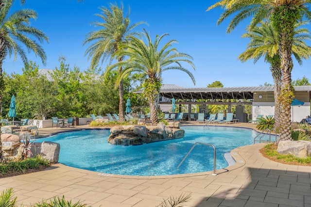 view of pool featuring a patio area