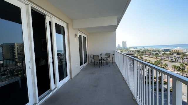 balcony featuring a water view