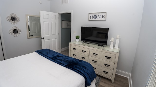 bedroom featuring light hardwood / wood-style floors